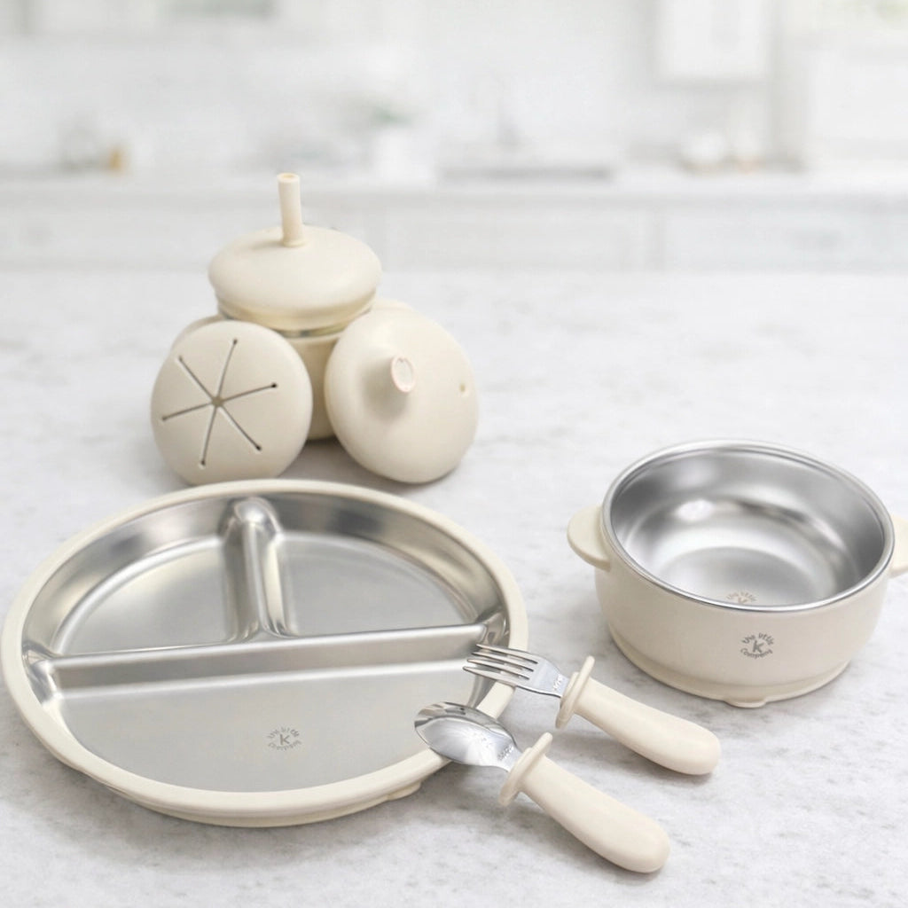 Set of kids stainless steel mealtime essentials including plate, bowl, utensils and convertible cup