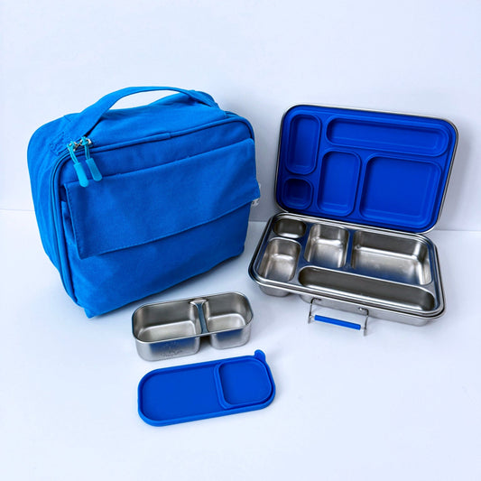 A blue lunch bag and stainless steel bento box set with blue lids, arranged on a clean white background.